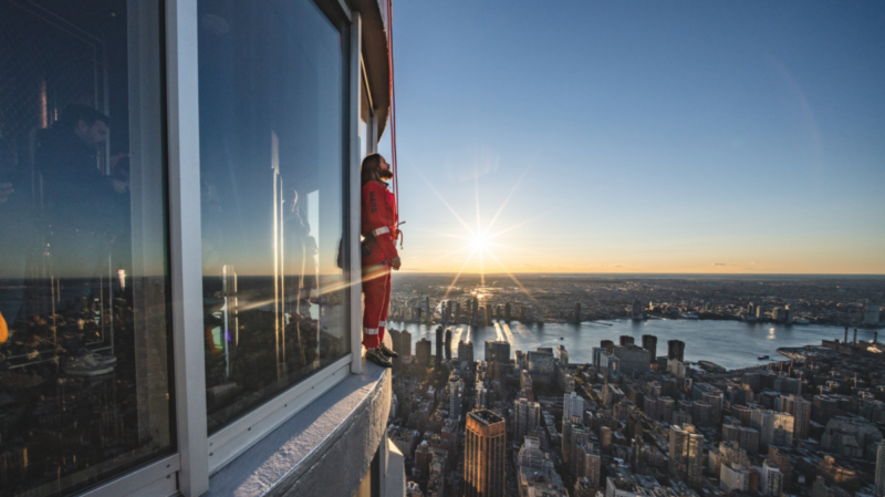 Jared Leto faces away from the Empire State Building during his ascent